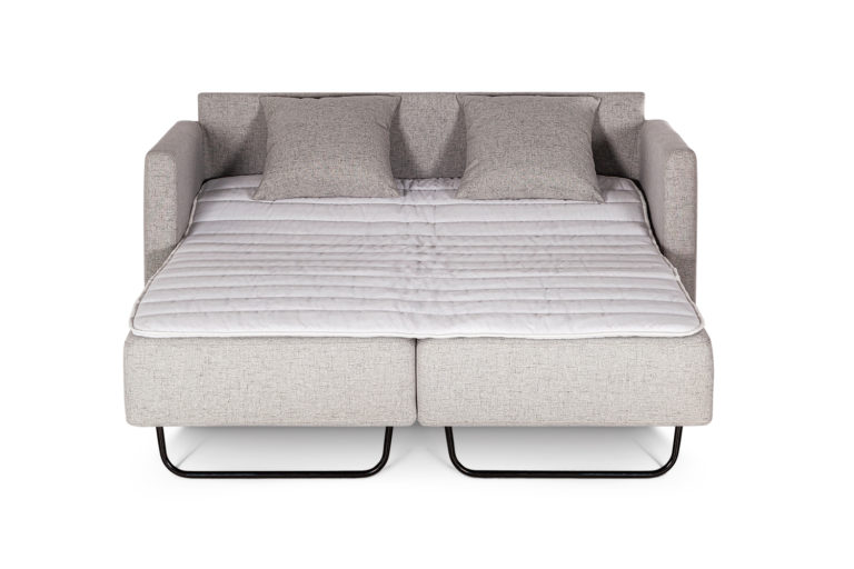 In picture: Nicole 2 opened into bed position. Fabric: Linea 16. Leg: 1, oak.