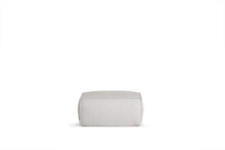 In picture: Robust footstool. Fabric: Wave 50.