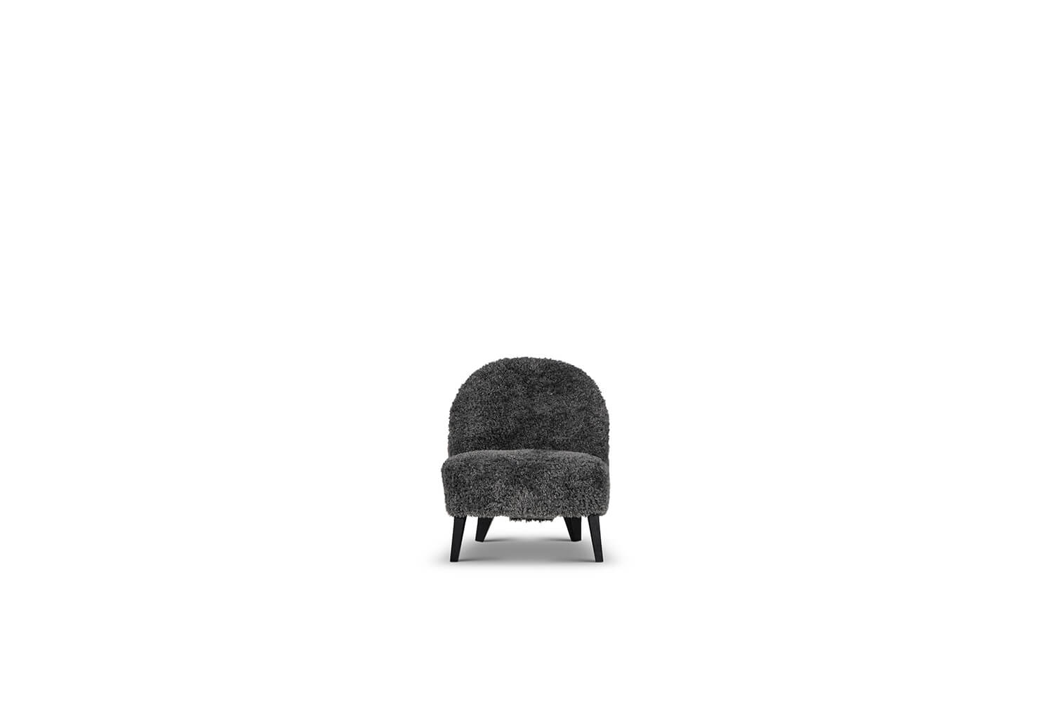 In picture: Rimini chair. Fabric: Snugs 768.